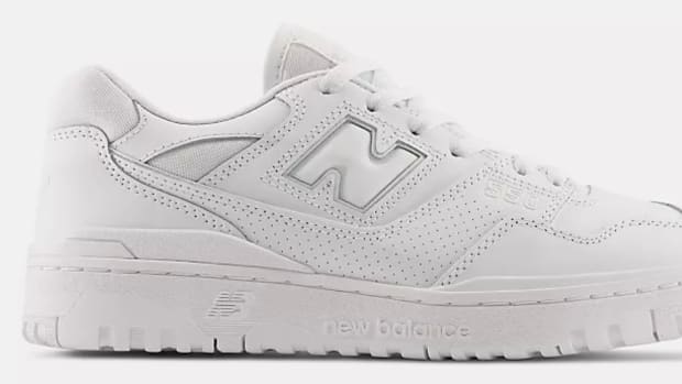 View of white New Balance shoe.